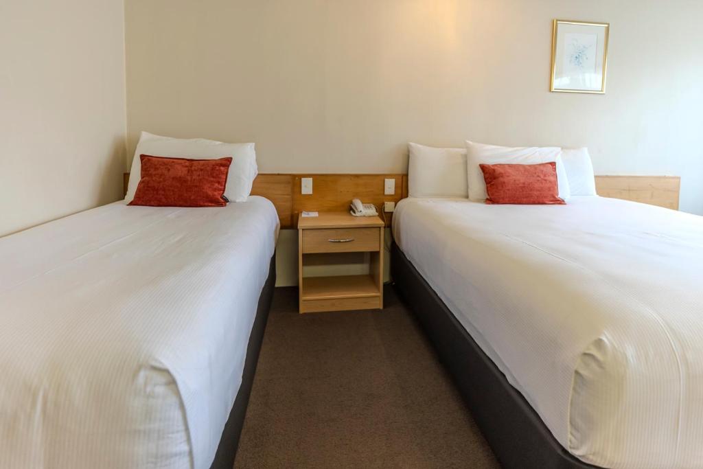 Postel nebo postele na pokoji v ubytování Kingsgate Hotel Te Anau