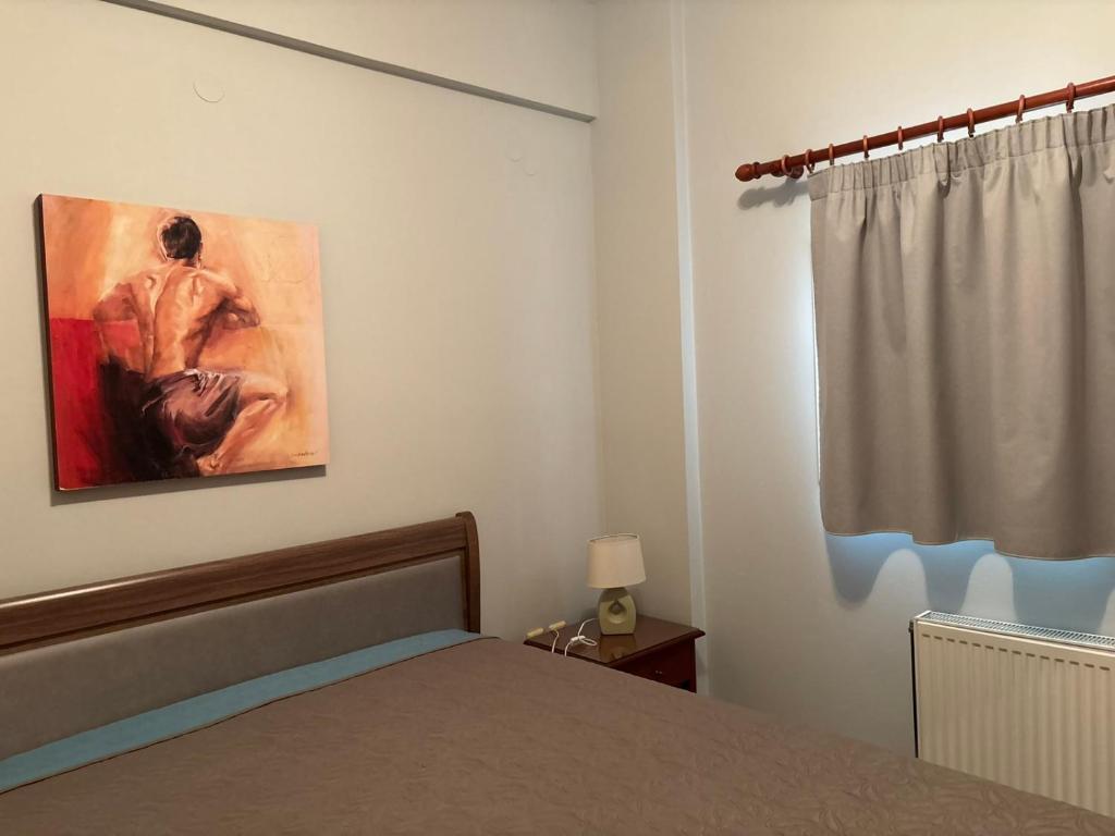 Postel nebo postele na pokoji v ubytování Iria Bay
