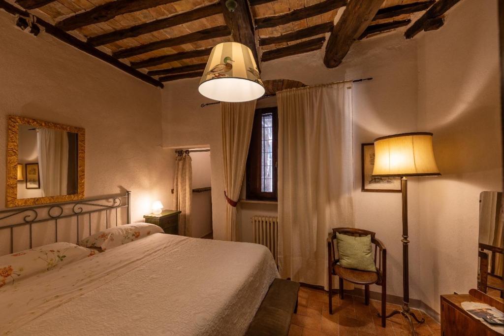 Postel nebo postele na pokoji v ubytování Guesthouse da Idolina dal 1946