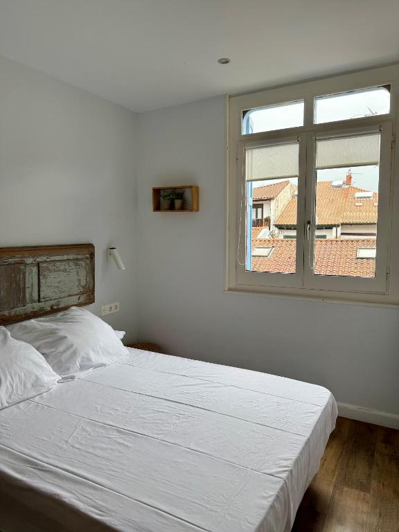 Postel nebo postele na pokoji v ubytování Hotel San Nikolas Sea Views