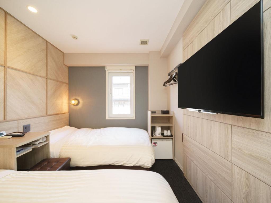 TV a/nebo společenská místnost v ubytování Super Hotel Hida Takayama