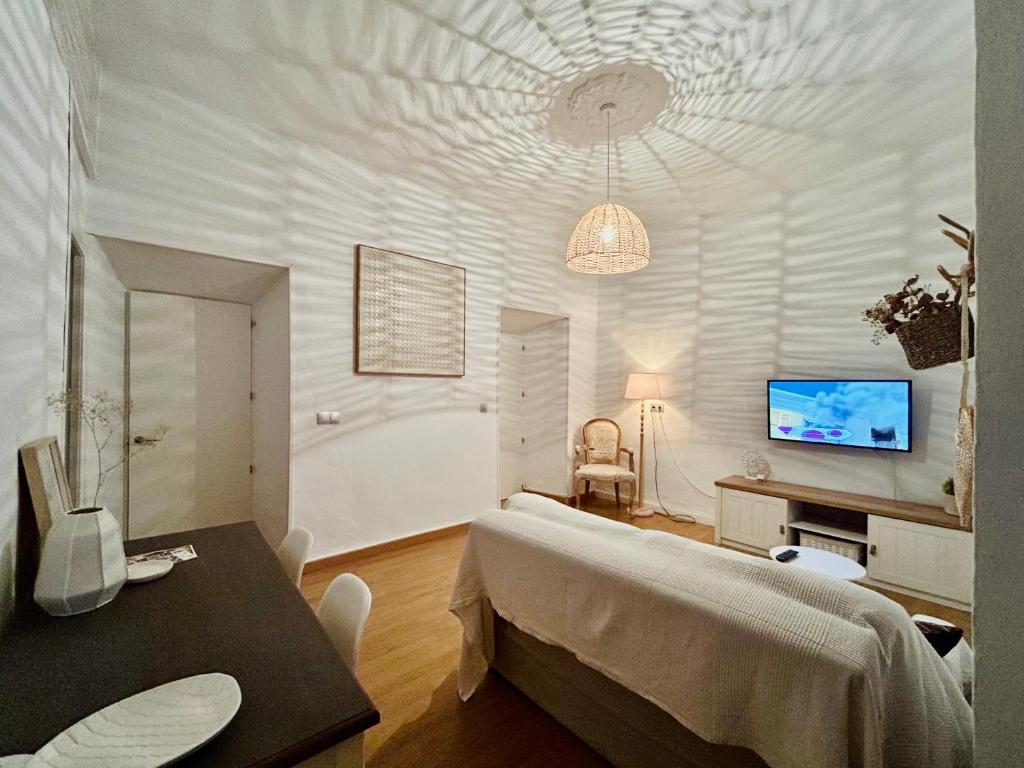 TV a/nebo společenská místnost v ubytování Casa titamari