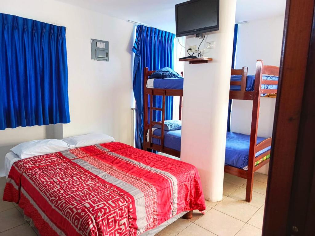 Postel nebo postele na pokoji v ubytování HOSTERIA LA COSTANERA