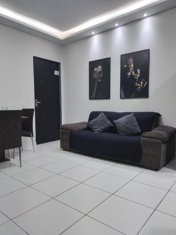 Khu vực ghế ngồi tại Apto próx de tudo com lazer e conforto COP30