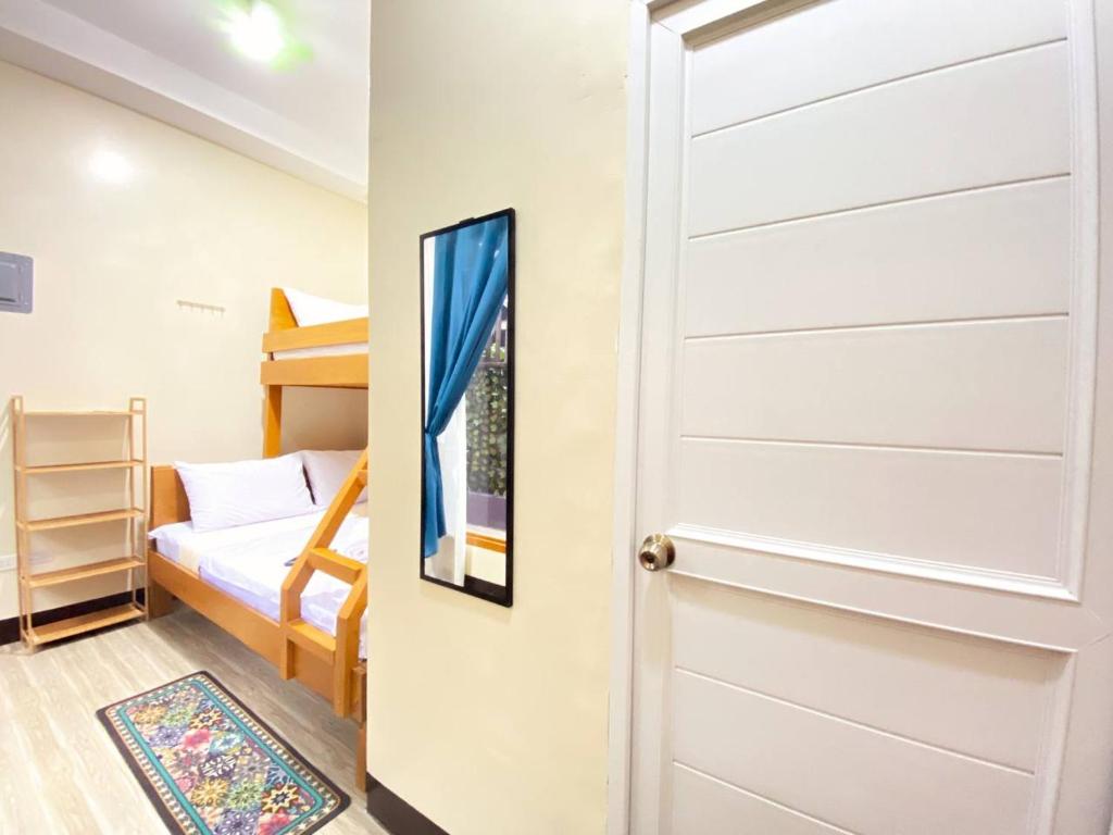 Postel nebo postele na pokoji v ubytování Sudla Siargao Hostel