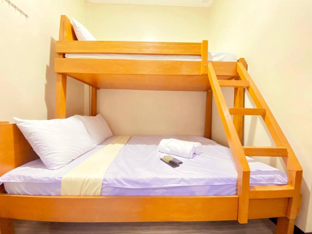 Postel nebo postele na pokoji v ubytování Sudla Siargao Hostel