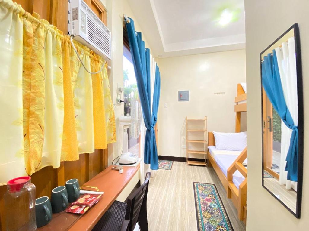 Postel nebo postele na pokoji v ubytování Sudla Siargao Hostel