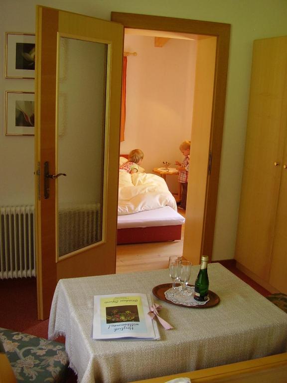 Rúm í herbergi á Gästehaus Elfriede