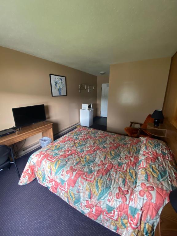 Postel nebo postele na pokoji v ubytování ValleyView Motel
