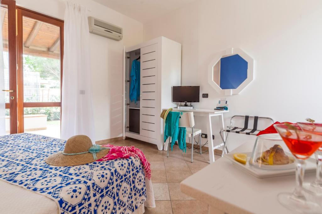 Postel nebo postele na pokoji v ubytování Hotel Orsa Maggiore