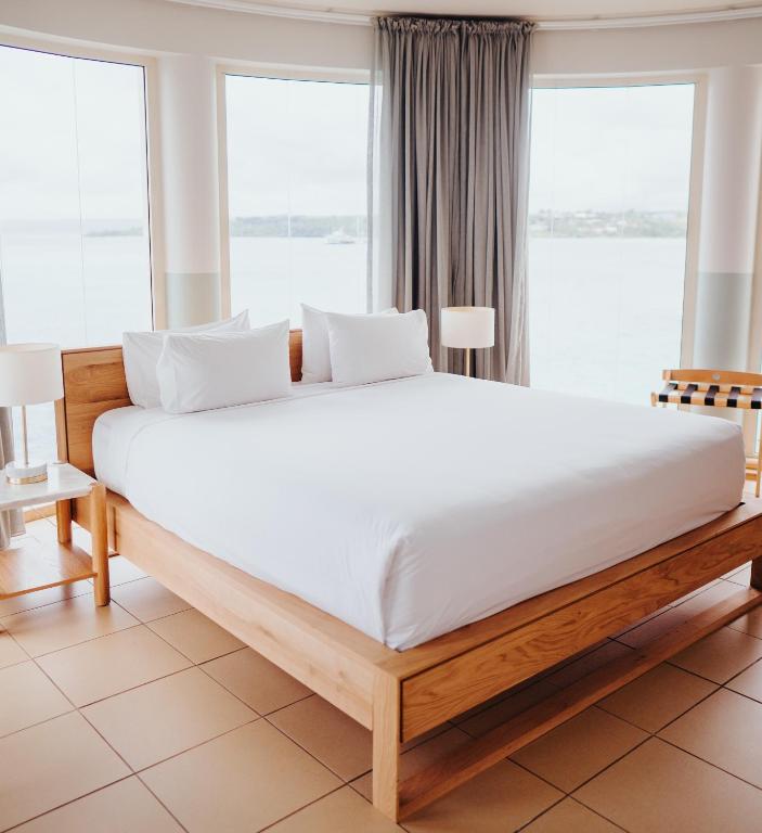 Postel nebo postele na pokoji v ubytování Grand Hotel & Casino