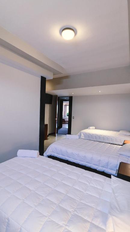 Casa Buena Hotel - Dreibettzimmer