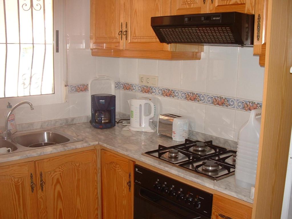 Kuchyň nebo kuchyňský kout v ubytování Villas Los Olivares - Deniasol