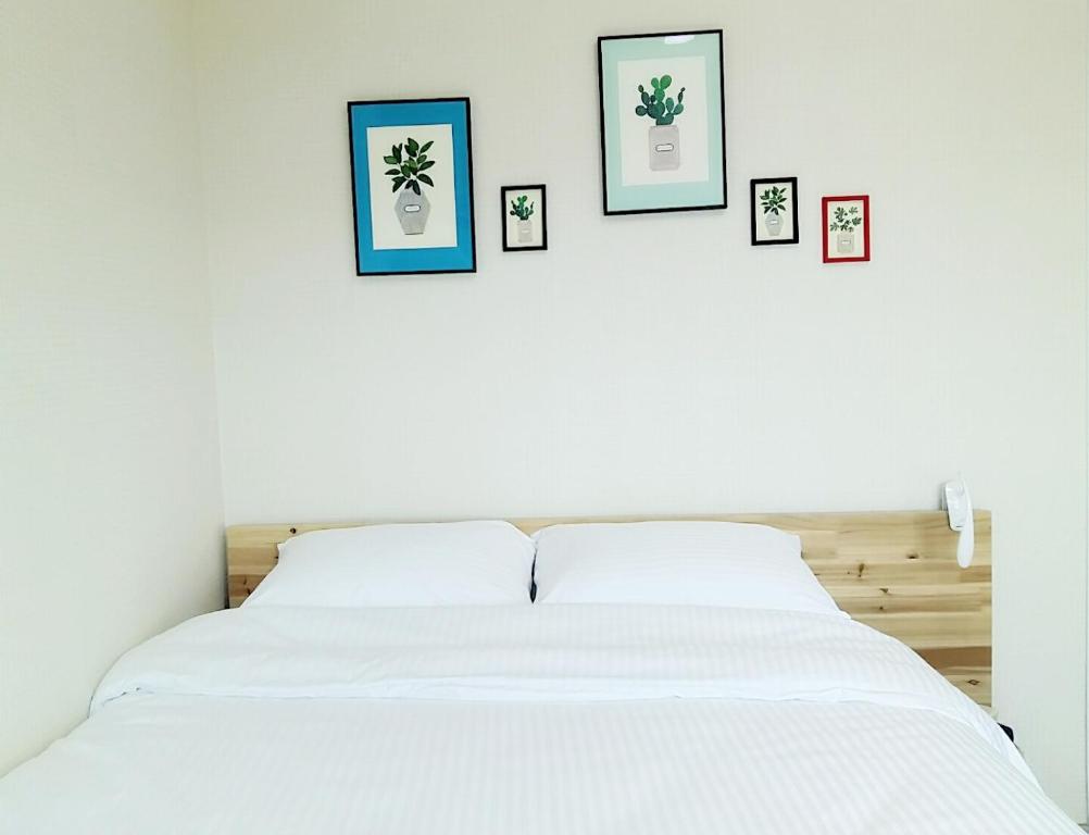Postel nebo postele na pokoji v ubytování Bae Bae Guesthouse