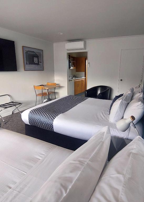 Postel nebo postele na pokoji v ubytování Lake Dunstan Motel