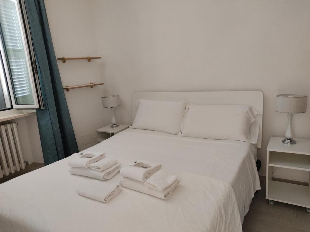 Postel nebo postele na pokoji v ubytování desideri 2
