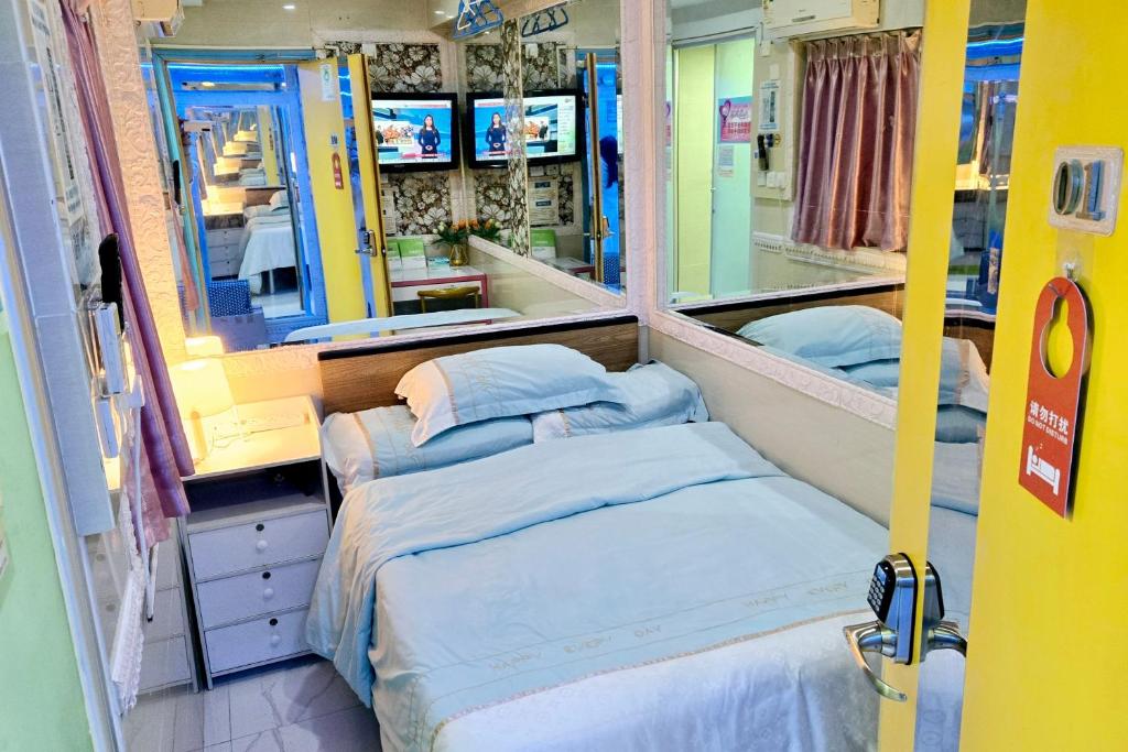 Giường trong phòng chung tại LongWin Hostel - Jordan MTR