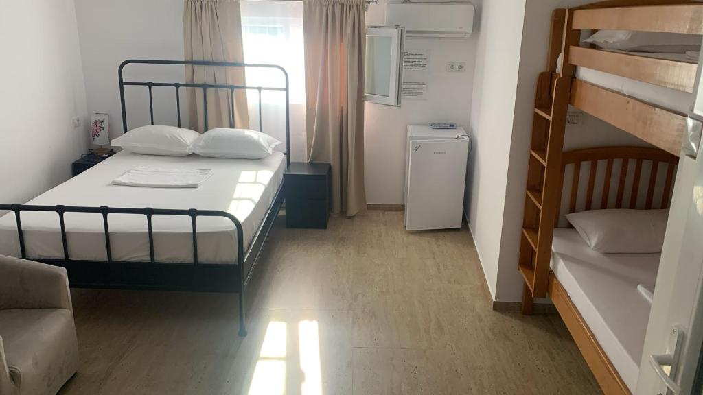 Postel nebo postele na pokoji v ubytování Casa Ciobi
