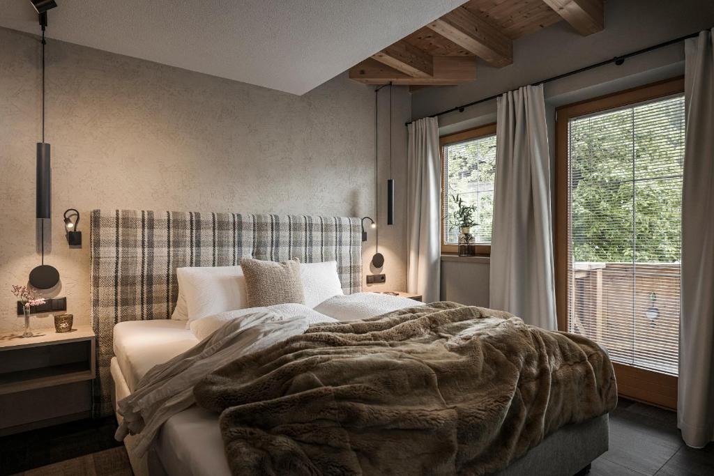 Postel nebo postele na pokoji v ubytování Leitnerhof