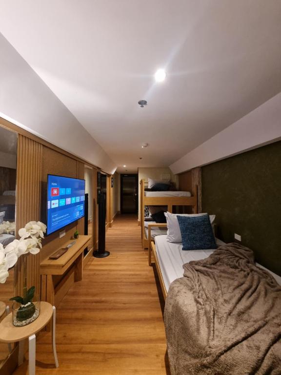 Sunset View Ridge Residences - Dreibettzimmer