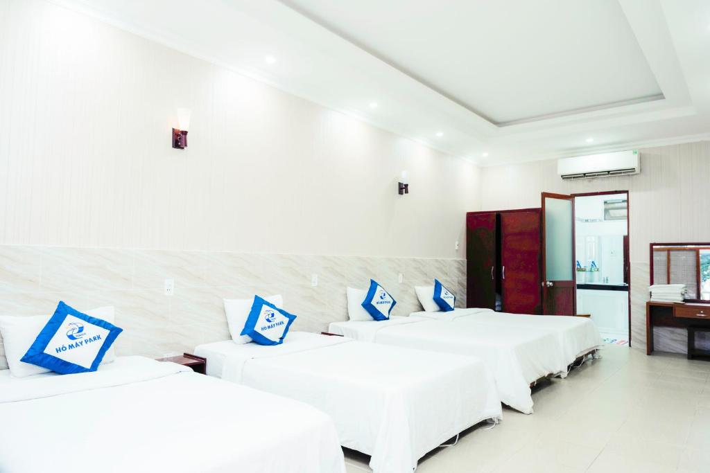 Postel nebo postele na pokoji v ubytování HỒ MÂY PARK Vũng Tàu Khách Sạn - Resort