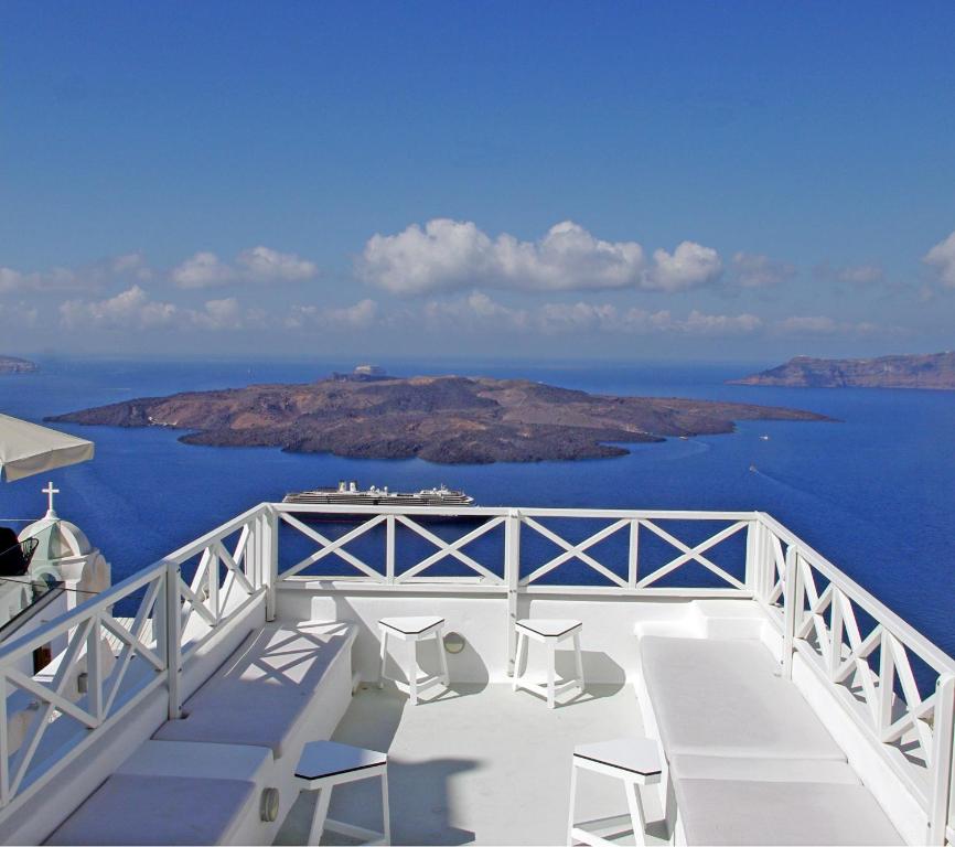 a view of the ocean from the deck of a cruise ship at Santoniro Villa in Fira