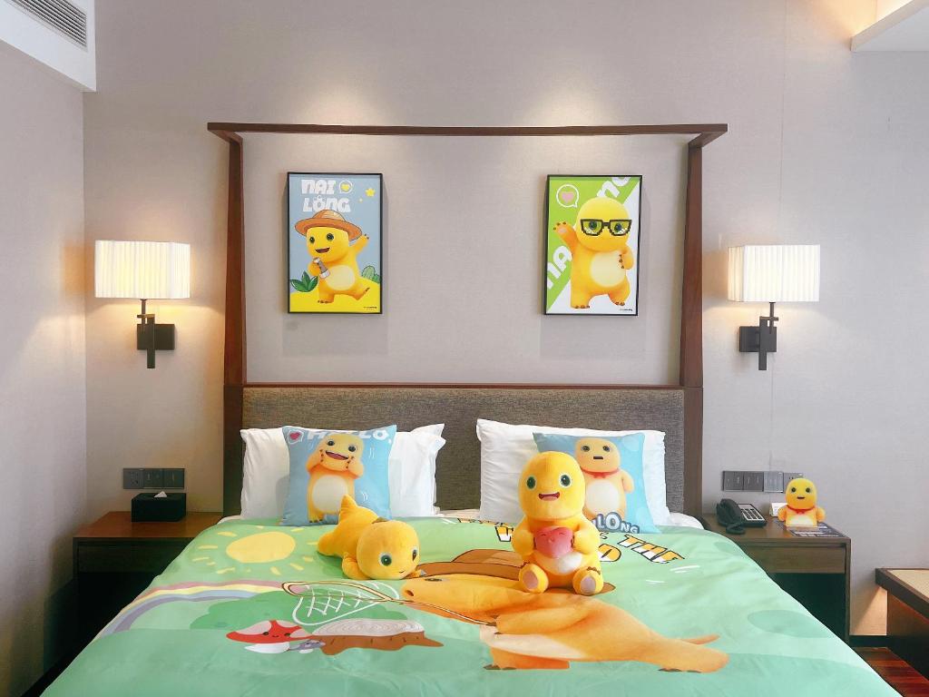 Postel nebo postele na pokoji v ubytování SSAW Boutique Hotel Foshan Qiandeng Lake