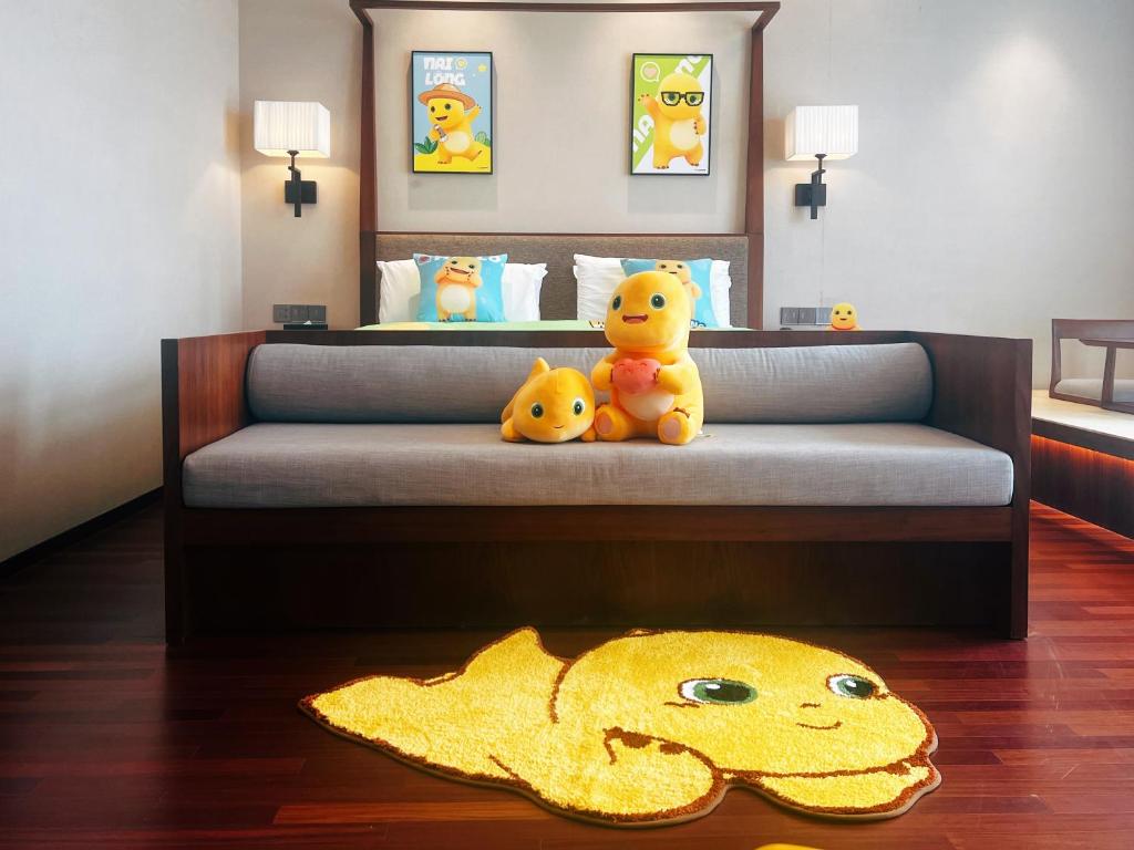 Postel nebo postele na pokoji v ubytování SSAW Boutique Hotel Foshan Qiandeng Lake