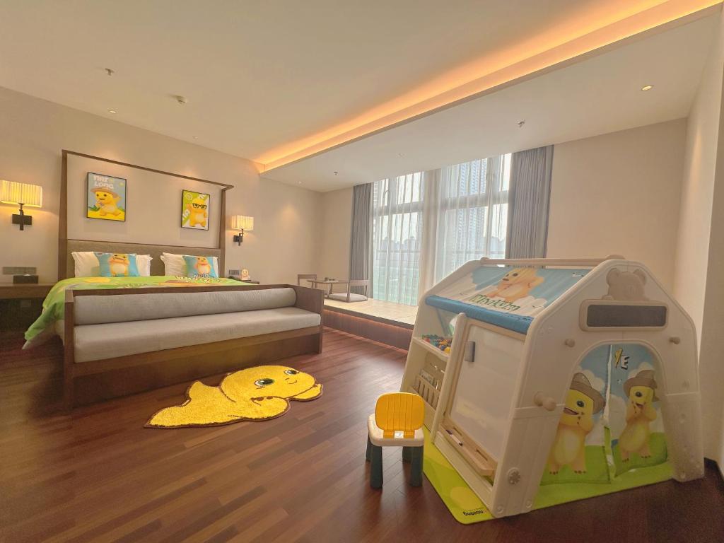 Postel nebo postele na pokoji v ubytování SSAW Boutique Hotel Foshan Qiandeng Lake