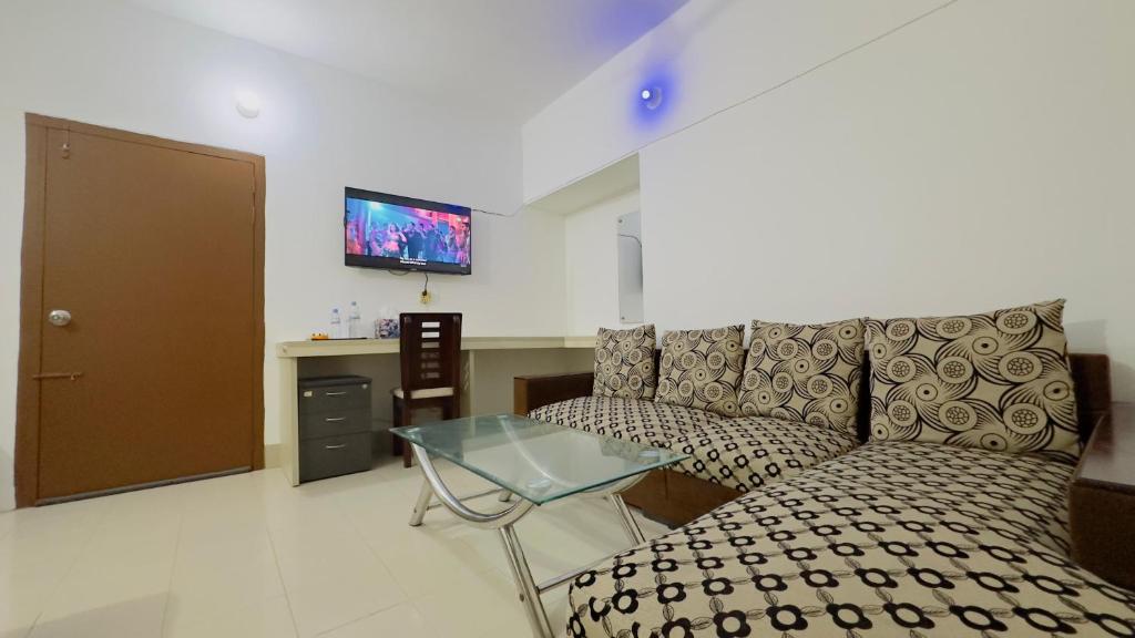 TV a/nebo společenská místnost v ubytování Chittagong Apartment Service