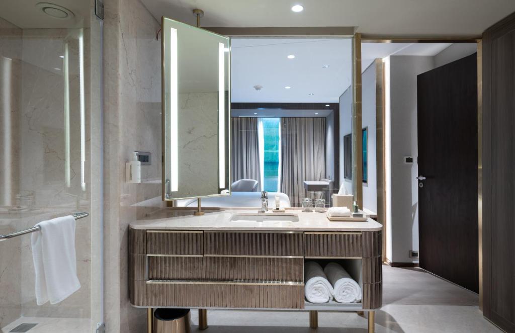 Koupelna v ubytování Merlis Hotel Coimbatore