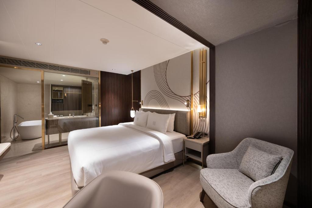 Posezení v ubytování Merlis Hotel Coimbatore