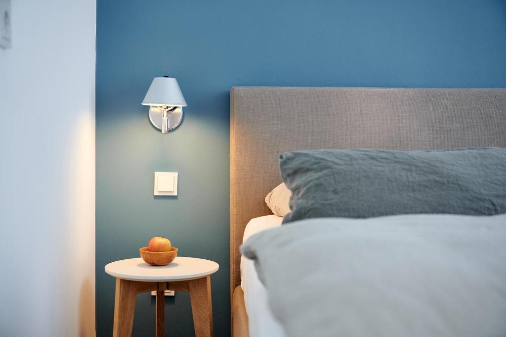 Postel nebo postele na pokoji v ubytování Hotel Aquamarin