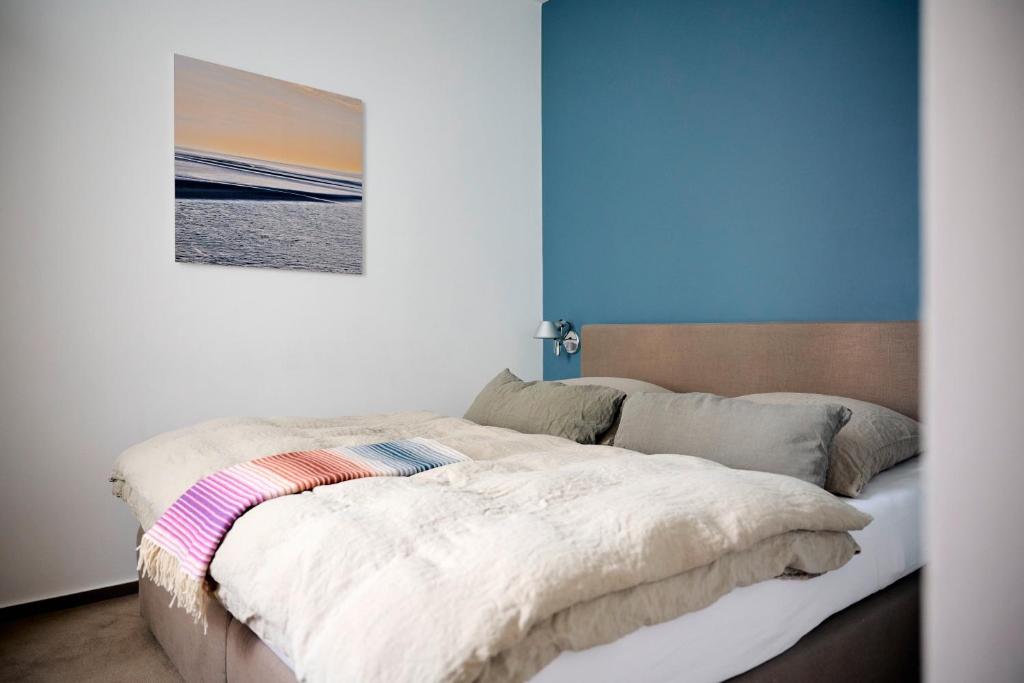 Postel nebo postele na pokoji v ubytování Hotel Aquamarin