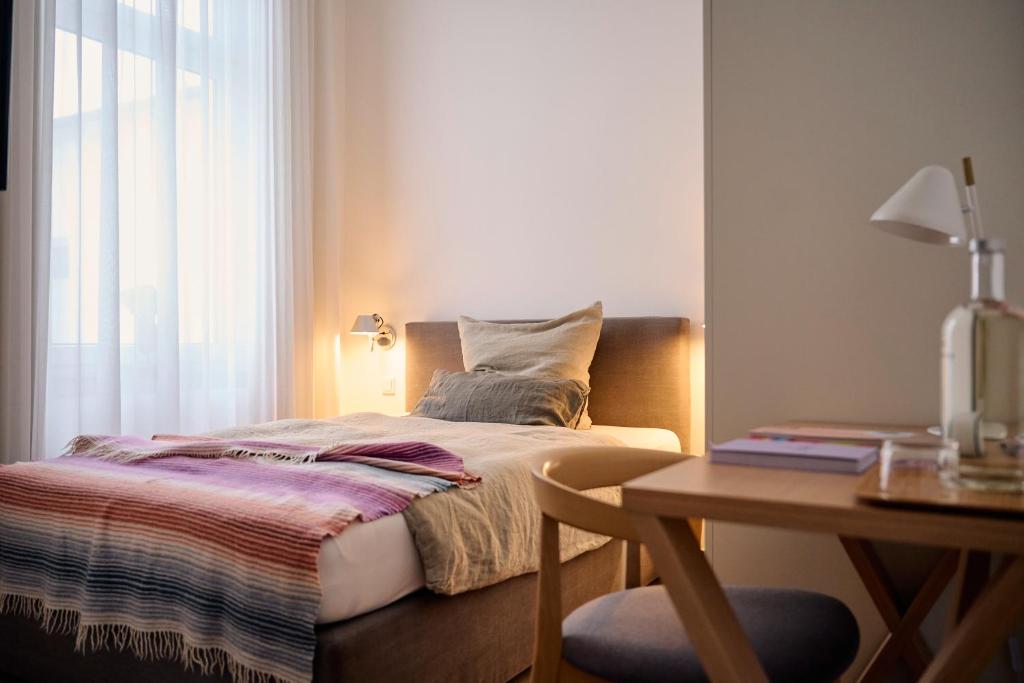 Postel nebo postele na pokoji v ubytování Hotel Aquamarin
