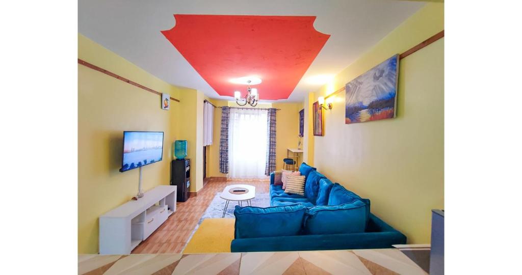 Μια τηλεόραση ή/και κέντρο ψυχαγωγίας στο Cosy One bedroom Thika Road,TRM