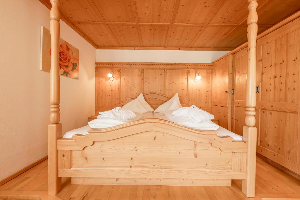Postel nebo postele na pokoji v ubytování Alpenpension Pfurtscheller