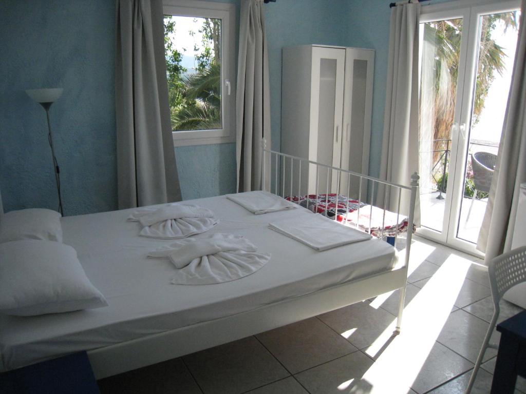 Katil atau katil-katil dalam bilik di Cavo Christo