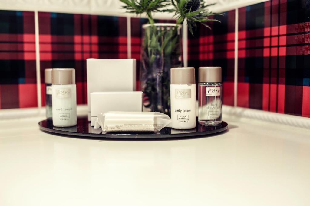 a tray with some products on a table at Carlton George Hotel in Glasgow