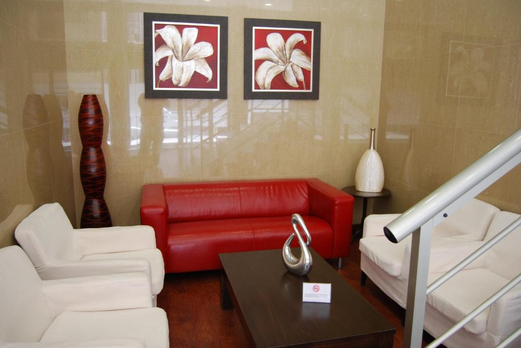 Postel nebo postele na pokoji v ubytování Hotel Anfora