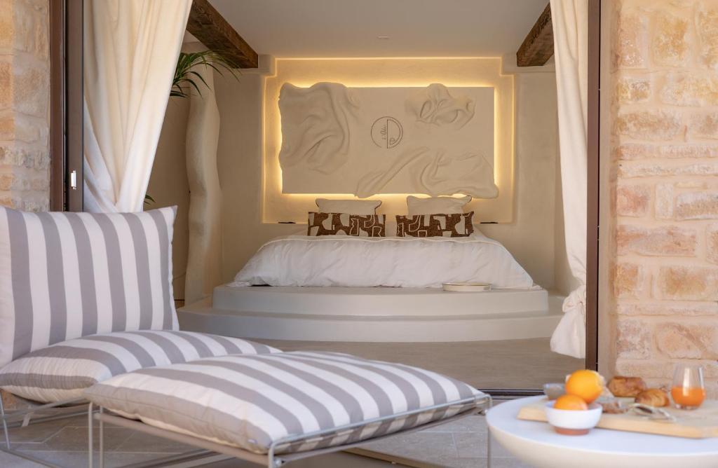 Postel nebo postele na pokoji v ubytování L Ode