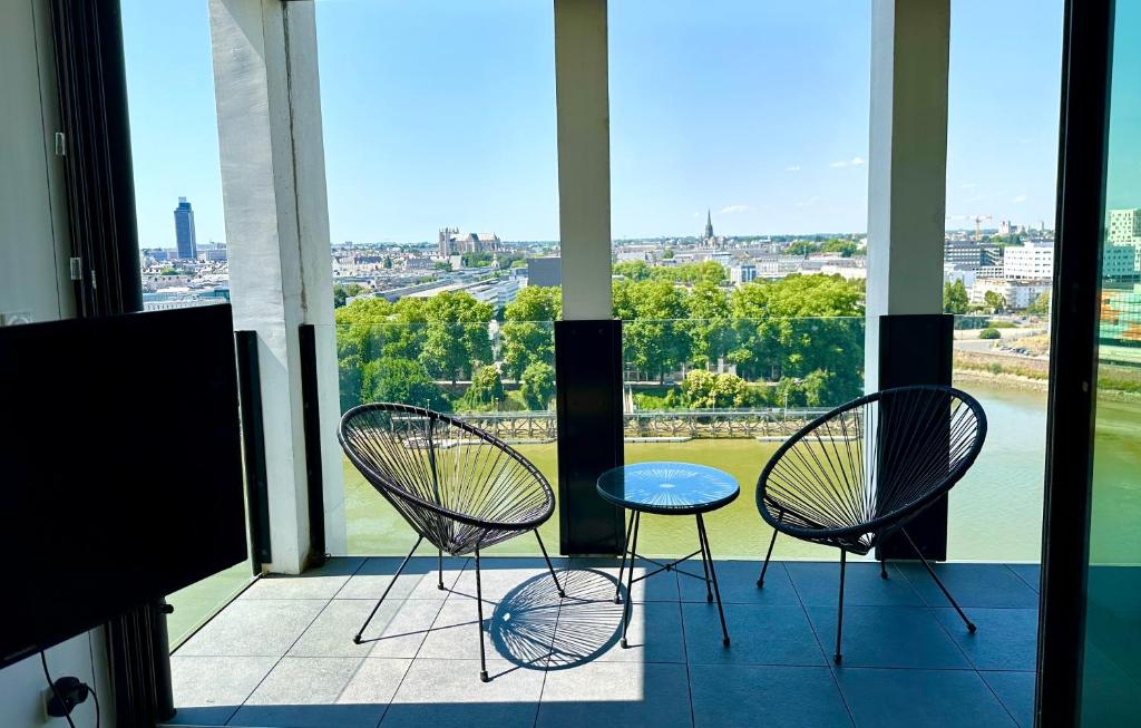 Balkón alebo terasa v ubytovaní Appartement standing Vue panoramique sur Nantes