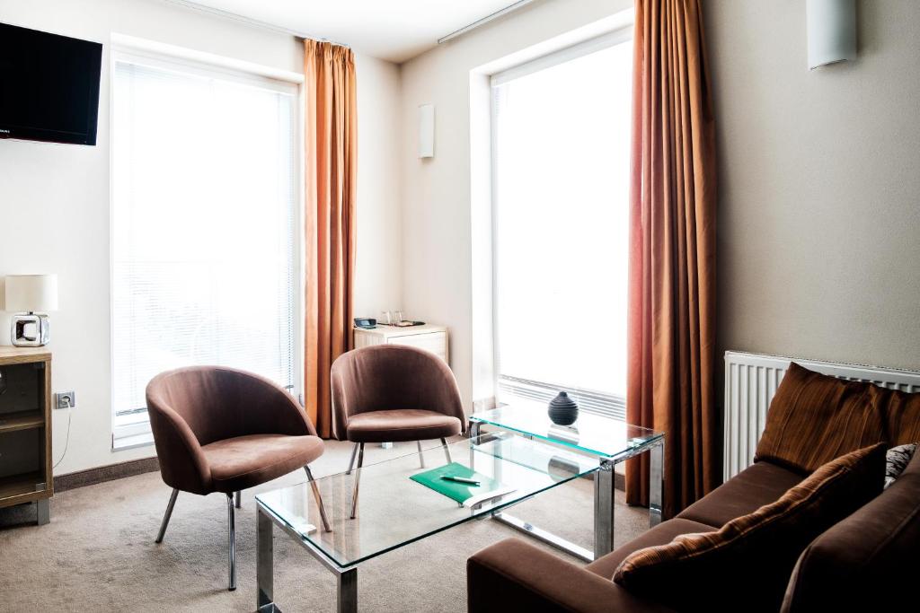 Posezení v ubytování Hotel Deluxe with free Wellness and Fitness Centrum
