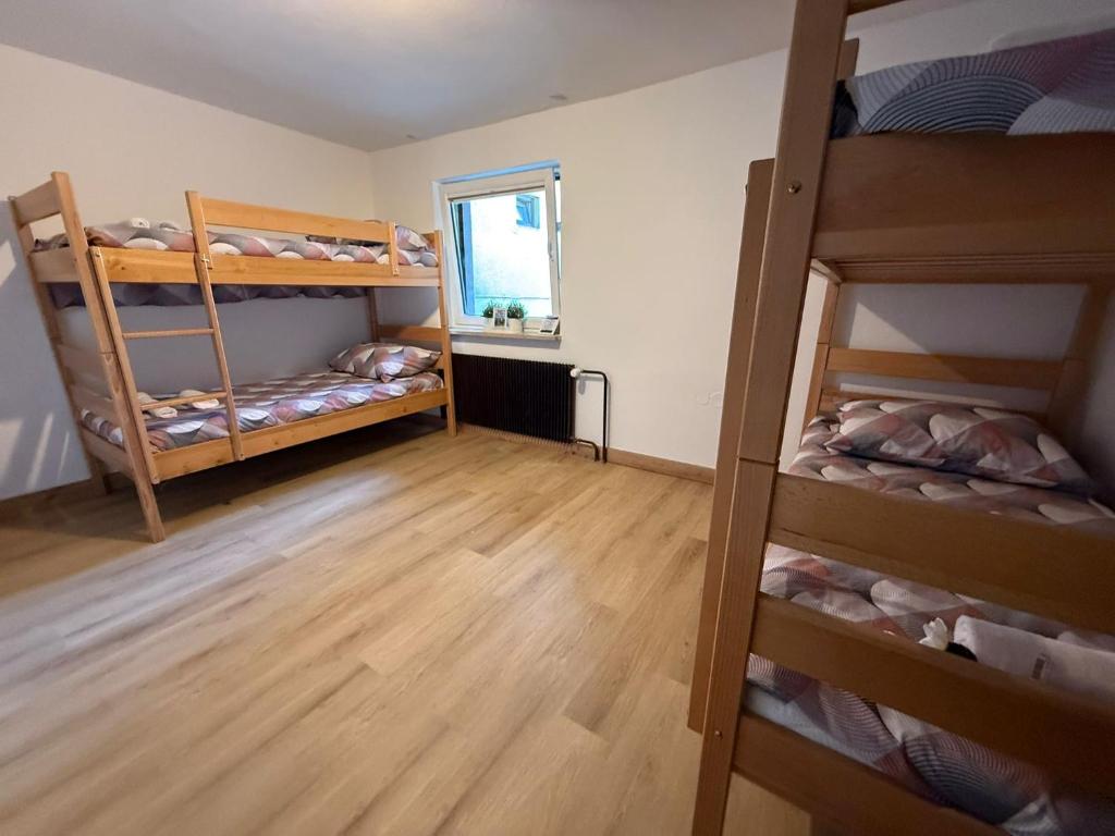 Postel nebo postele na pokoji v ubytování Bed & Breakfast LakeBled House