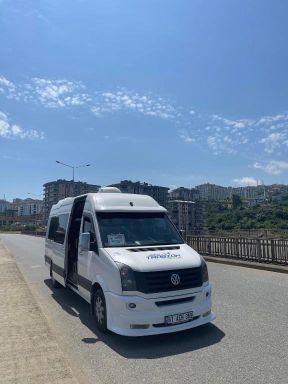 a white van is parked on the road at Gezi Trabzon Turizm in Trabzon