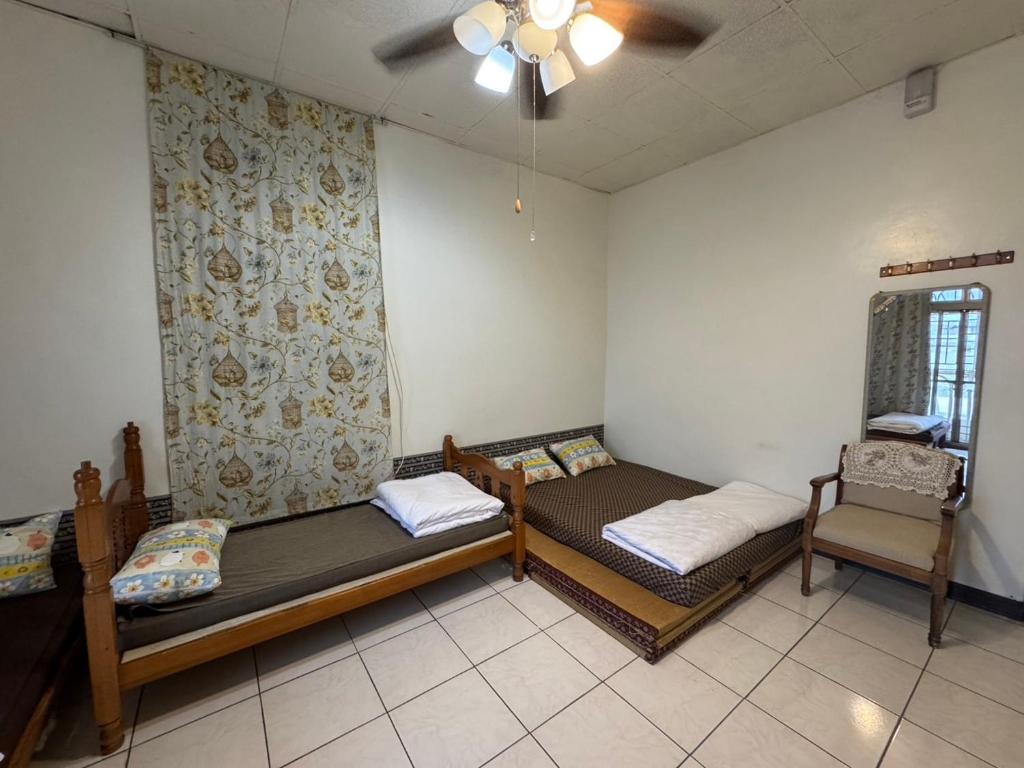 Letto o letti in una camera di 以諾亞的家一館
