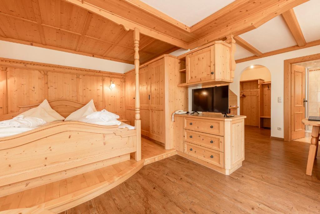 Postel nebo postele na pokoji v ubytování Alpenpension Pfurtscheller