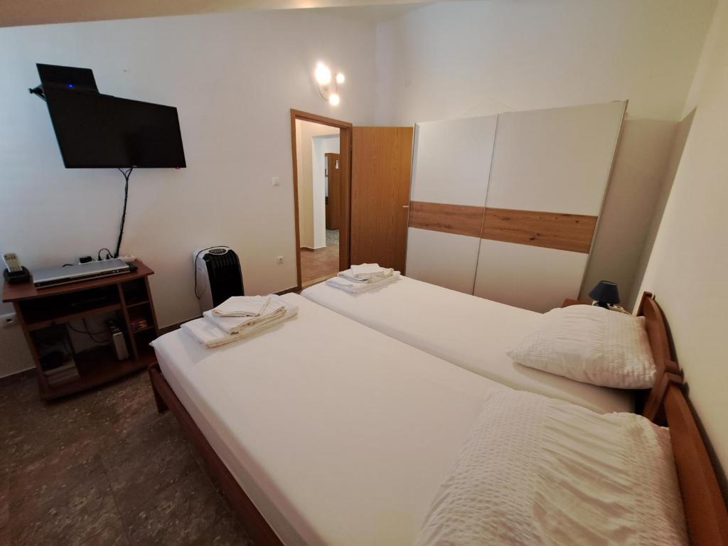 Posteľ alebo postele v izbe v ubytovaní Apartman GRL