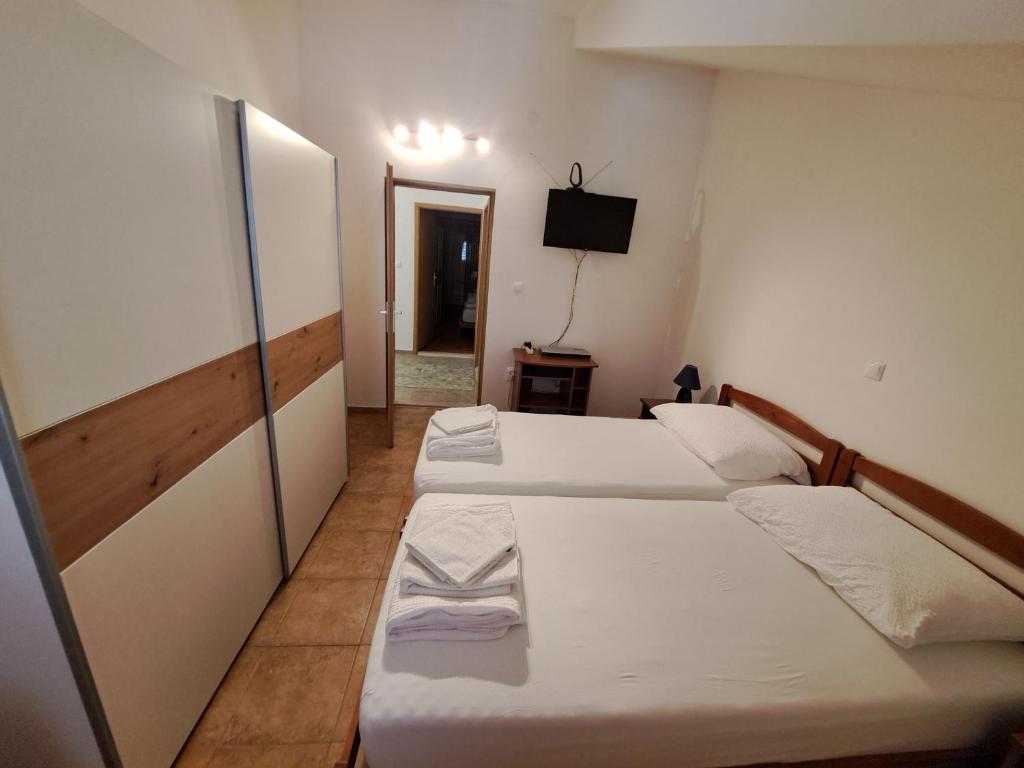 Posteľ alebo postele v izbe v ubytovaní Apartman GRL