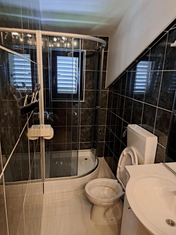 Kúpeľňa v ubytovaní Apartman GRL